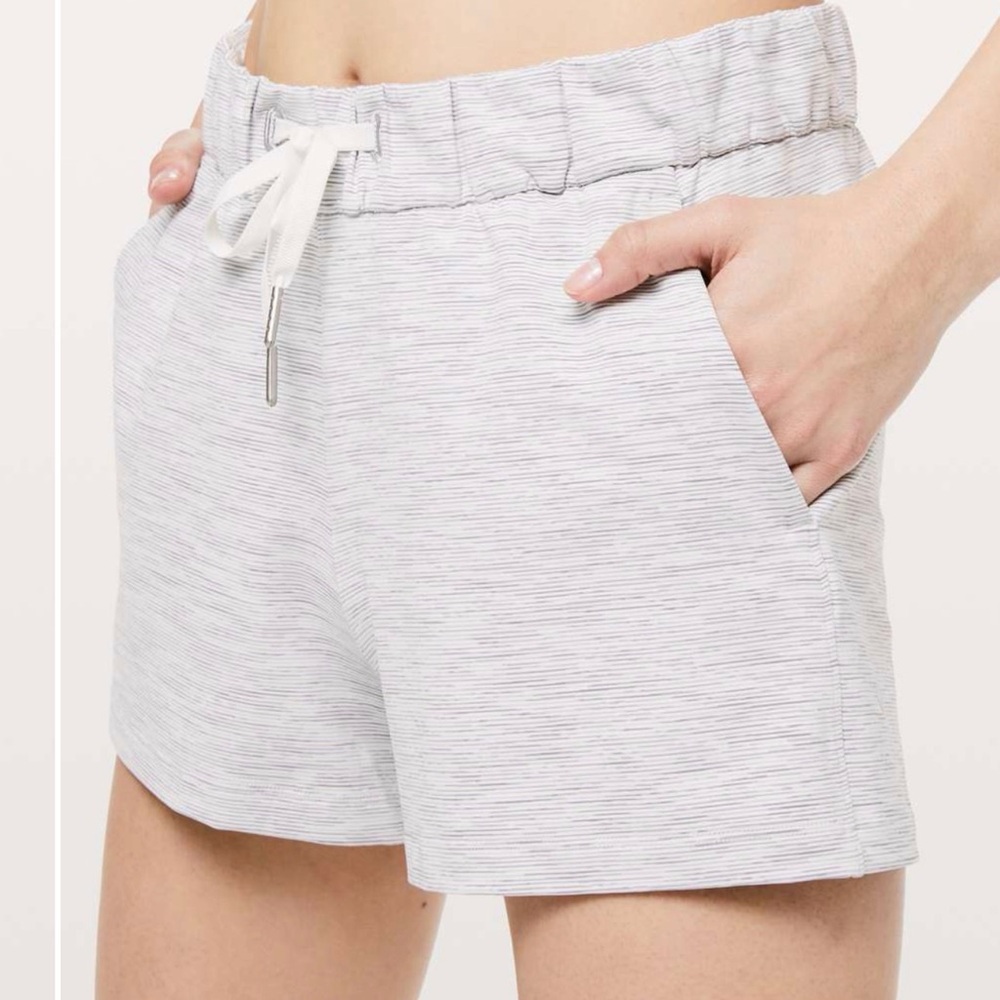 Lululemon Athletica On the Fly shorts in Wee are from Space Alpine Gray